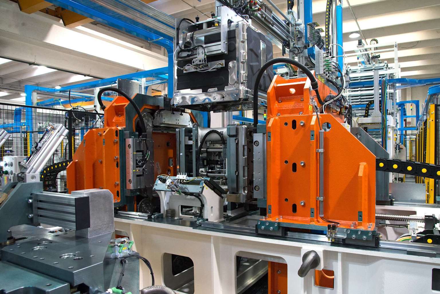 Automated machinery on a modern dishwasher production line
