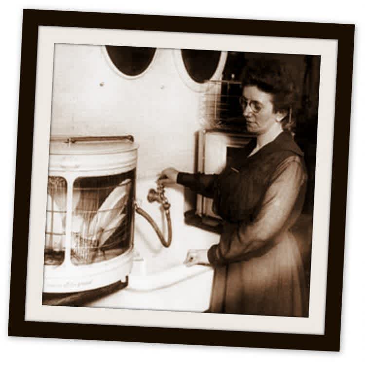 Josephine Cochrane with her early hand-powered dishwasher, demonstrating a foundational design in dishwasher history
