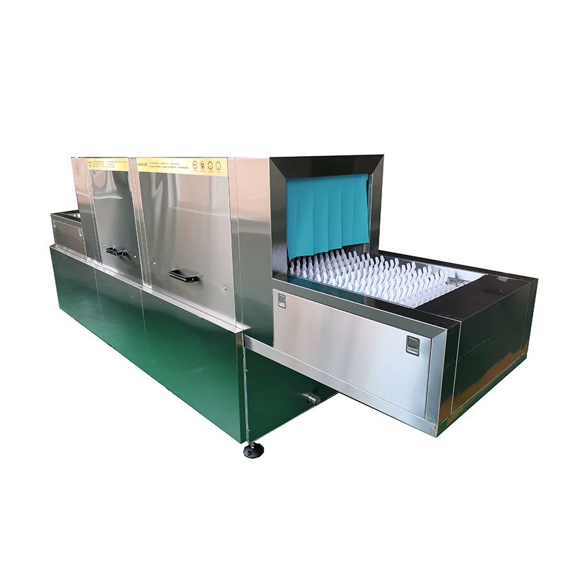 A commercial stainless steel conveyor dishwasher with a green base and internal conveyor system